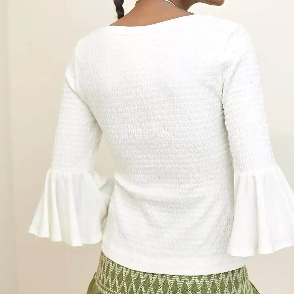 Anthropologie smocked bell
